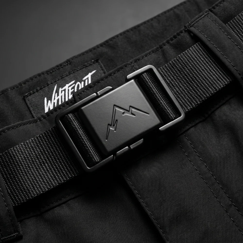 Black buckle embossed with a twin-peak emblem on black webbing