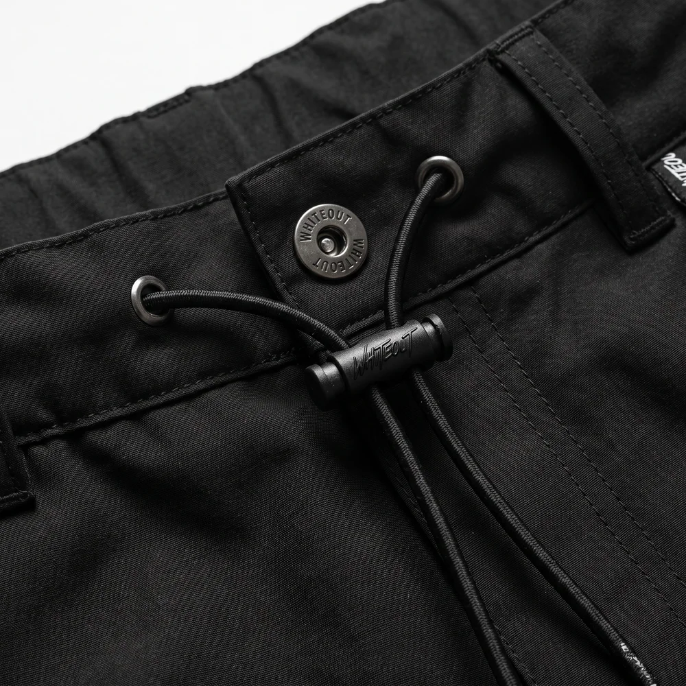 Black waistband with elastic drawcord, toggle and metal snap